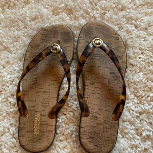 lightly used michael kors flip flops size 8